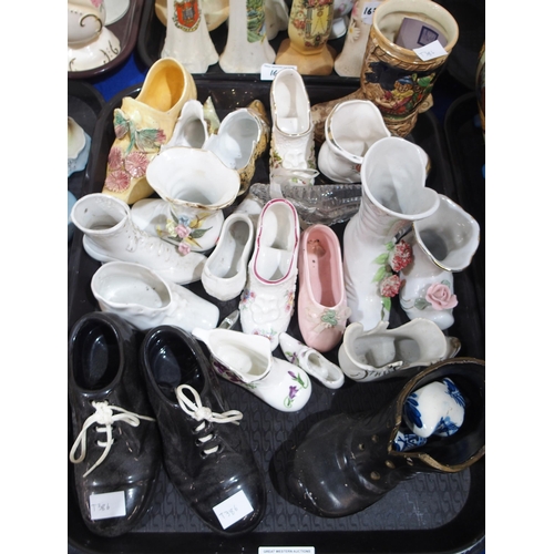 168 - A collection of biscuit barrels, ceramic shoes etc