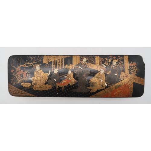 203 - A Japanese gilded lacquer box, of rectangular form, decorated with scenes from everyday life, a simi... 