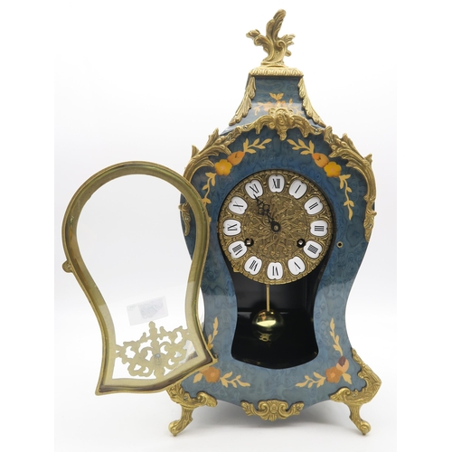 213 - A French Louis XVI style clock with green dyed inlaid wood case, the gilt dial with enamelled roman ... 