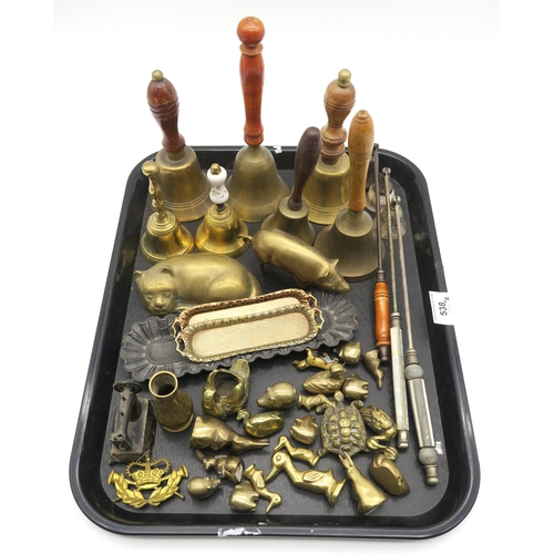 538 - Assorted brassware, to include a collection of boots and shoes of various sizes, table bells, orname... 