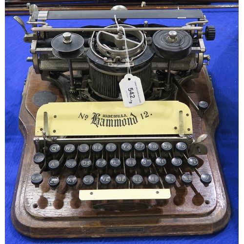 542 - A Hammond No. 12, housed in an oak case, together with an Oliver No. 5 Standard Visible typewriter a... 