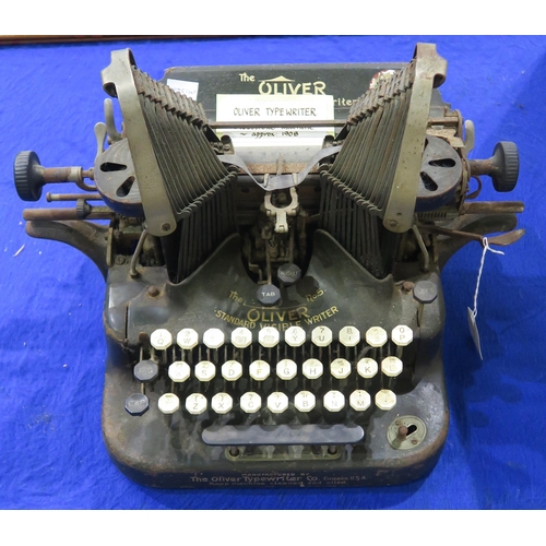 542 - A Hammond No. 12, housed in an oak case, together with an Oliver No. 5 Standard Visible typewriter a... 