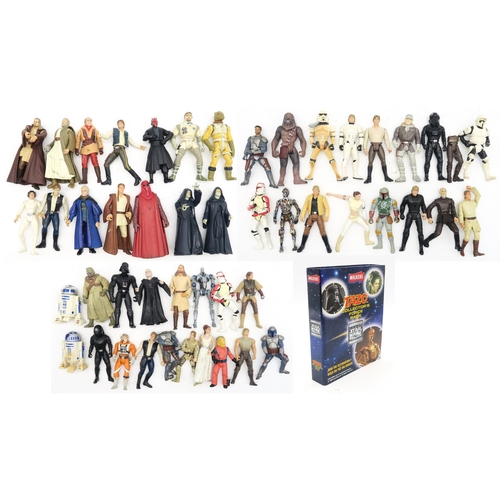 548 - Star Wars: a collection of 1990s/2000s-era small scale action figures and a Tazo Collector's Force P... 