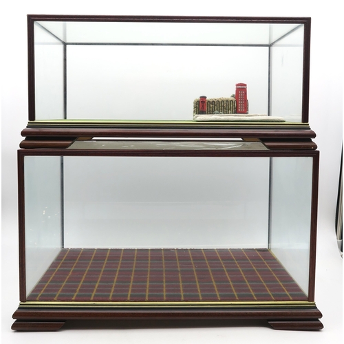 568 - Two glazed display cases by Timbercraft, the slightly larger measuring approx. 45cm wide x 24cm high... 