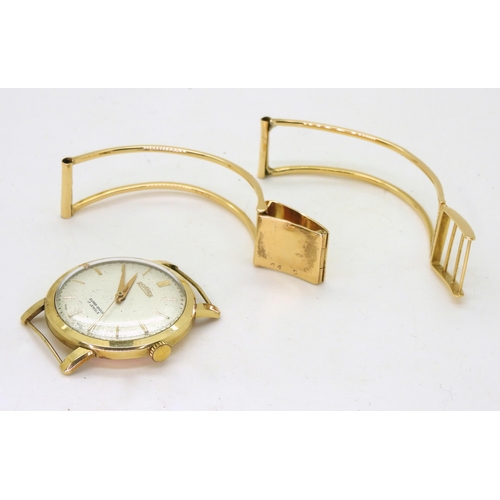 767 - A 14k gold Roamer gents watch head, weight including mechanism 25.3gms, together with an Italian mad... 