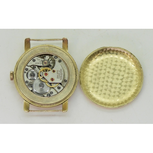 767 - A 14k gold Roamer gents watch head, weight including mechanism 25.3gms, together with an Italian mad... 