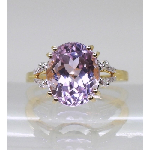 773 - A 9ct gold oval kunzite and diamond ring, finger size K, weight 3gms, with GemsTV certificate and ta... 