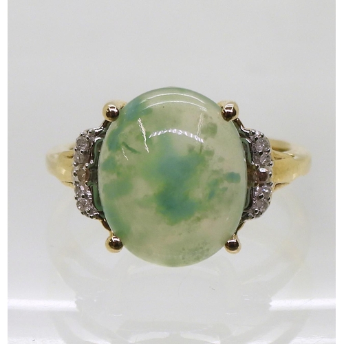 801 - A 9ct gold pale green hardstone and diamond ring, size J1/2, weight 3gms