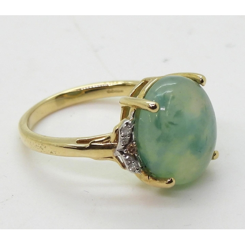 801 - A 9ct gold pale green hardstone and diamond ring, size J1/2, weight 3gms