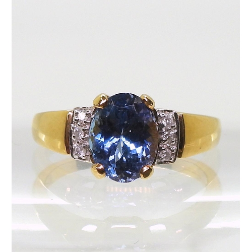 802 - An 18ct gold kyanite and diamond ring, size N1/2, weight 4.7gms