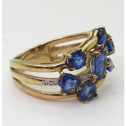 804 - A 9ct gold kyanite and diamond cluster ring, size L1/2, weight 4.1gms