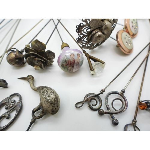 812 - A good collection of hatpins, to include eleven Charles Horner silver topped, Art Nouveau style, som... 