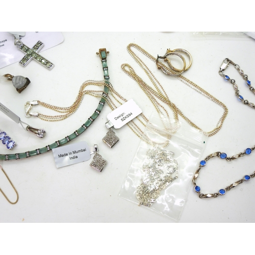 824 - A collection of silver Gems TV jewellery and other items to include silver chains, two diamond set p... 