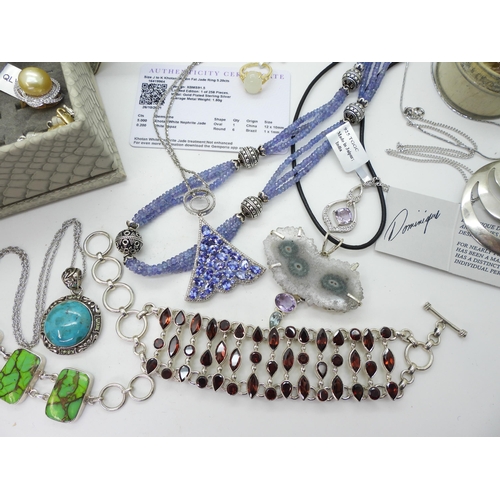 825 - A collection of GemsTV silver jewellery to include a garnet bracelet, tanzanite beads and a pendant,... 