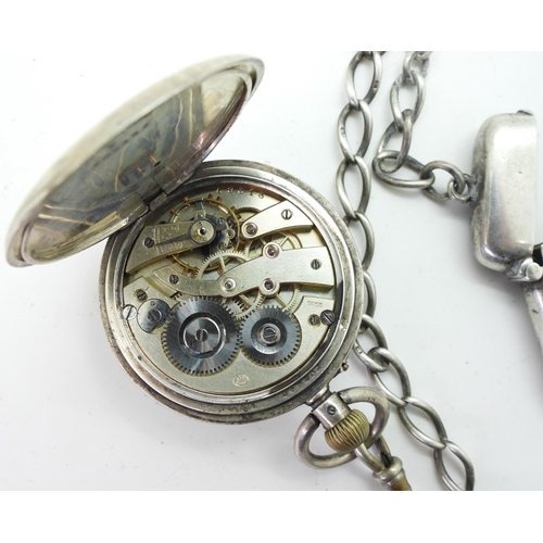 828 - A continental silver half hunter pocket watch with applied yellow metal and enamel chapter ring,the ... 