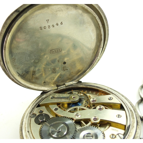 828 - A continental silver half hunter pocket watch with applied yellow metal and enamel chapter ring,the ... 