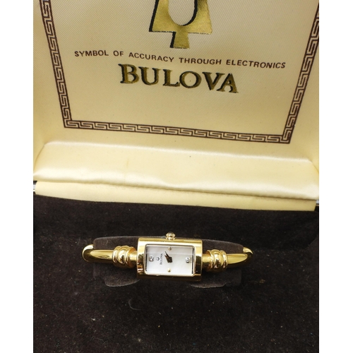 829 - A collection of watches to include, a ladies gold plated Bulova with diamond set mother of pearl dia... 