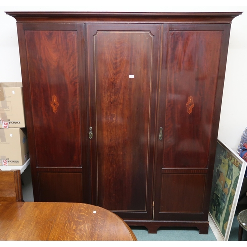 124 - A late Victorian mahogany three door wardrobe, 209cm high x 186cm wide x 57cm deep