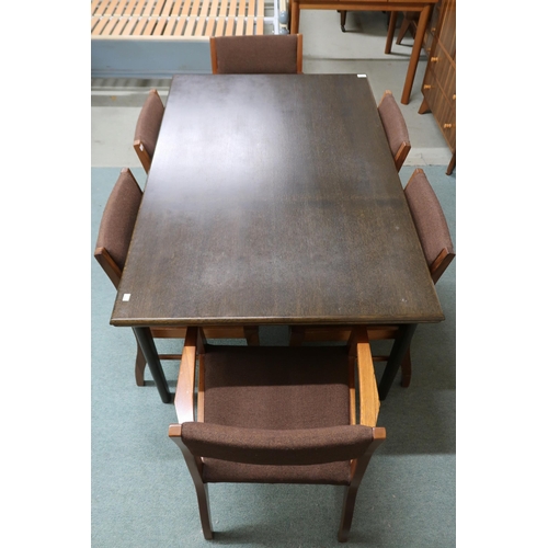 65 - A mid 20th century dining suite consisting ash extending dining table on shaped stylized supports, 7... 