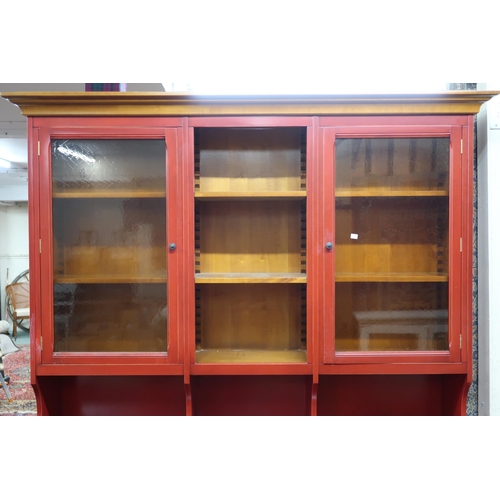 73 - A 20th century red painted Grange kitchen dresser with moulded cornice over central open shelves fla... 