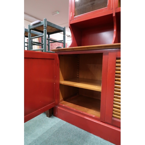 73 - A 20th century red painted Grange kitchen dresser with moulded cornice over central open shelves fla... 