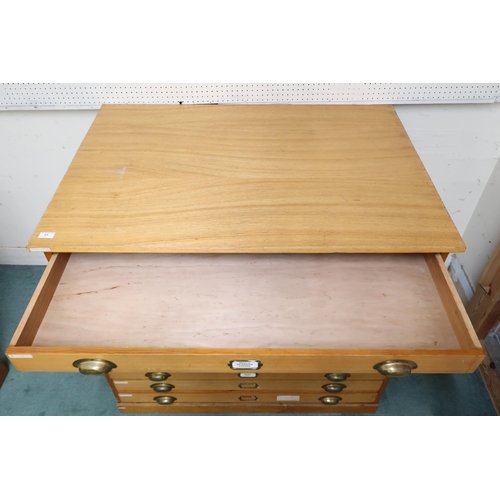 77 - A 20th century nine drawer plan chest with brass cup handles, 98cm high x 112cm wide x 79cm deep