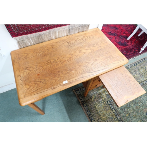 84 - A 20th century oak desk with kneehole alongside three drawer pedestal, 69cm high x 106cm wide x 60cm... 