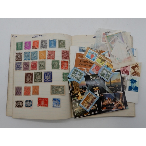 361 - An early  German Schaubek stamp album together with note book of stamps and loose examples