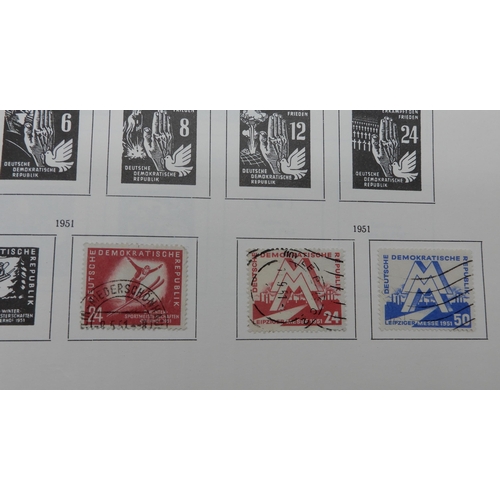 368 - GERMANY a quantity of stamps mint and used in albums to include DDR, Berlin Allied Zones, Federal Re... 