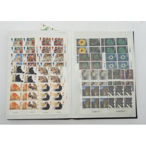 390 - GREAT BRITAIN a stock book containing commemorative stamps from 1991 to 1997 mostly in blocks of six