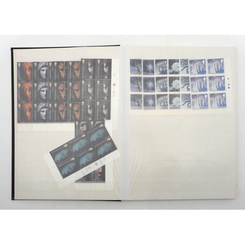 392 - GREAT BRITAIN a stock book containing decimal commemorative blocks of six together with strips of fo... 