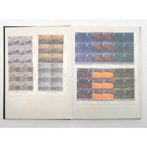 392 - GREAT BRITAIN a stock book containing decimal commemorative blocks of six together with strips of fo... 