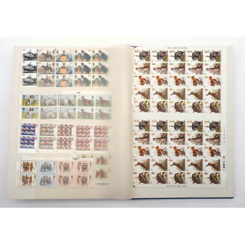 394 - GREAT BRITAIN a large quantity in two stock books, mainly commemorative but to include decimal defin... 