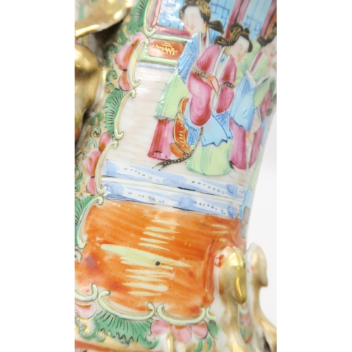 2362 - A PAIR OF CANTON BALUSTER VASESPainted with panels of figures, birds, insects and foliage, within gi... 