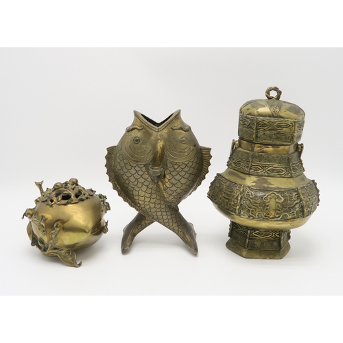 2376 - A CHINESE BRASS PEACH INCENSE BURNERWith wooden stand, 13 x 20cm, an archaic style vase and cover, 1... 