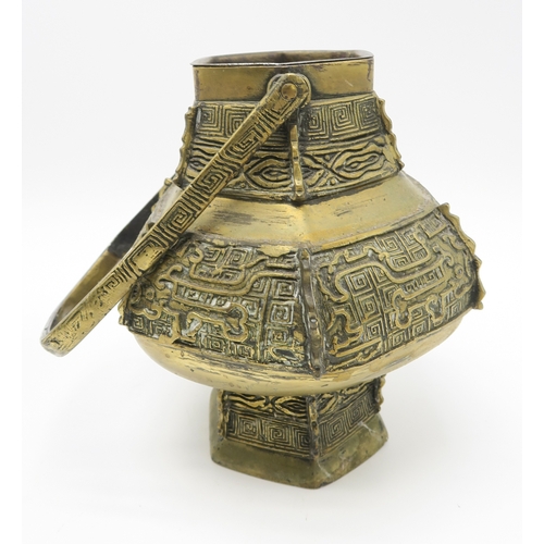 2376 - A CHINESE BRASS PEACH INCENSE BURNERWith wooden stand, 13 x 20cm, an archaic style vase and cover, 1... 