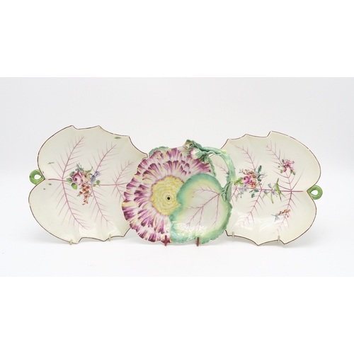 2218 - A NEAR PAIR OF CHELSEA LEAF SHAPED DISHESeach with painted puce veined detail and floral bouquets, t... 