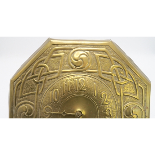 2226 - A GLASGOW SCHOOL CELTIC REVIVAL WALL CLOCKof octagonal form with repousse knotwork decoration and Ar... 