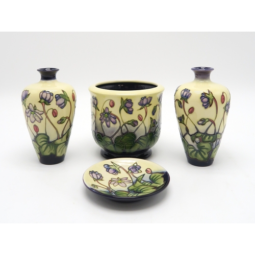 2228 - A PAIR OF MOORCROFT HEPATICA PATTERN VASESof tapering form, 15.5cm high together with a small jardin... 