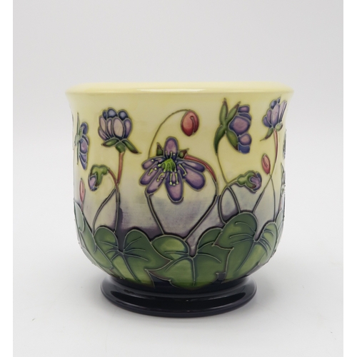 2228 - A PAIR OF MOORCROFT HEPATICA PATTERN VASESof tapering form, 15.5cm high together with a small jardin... 