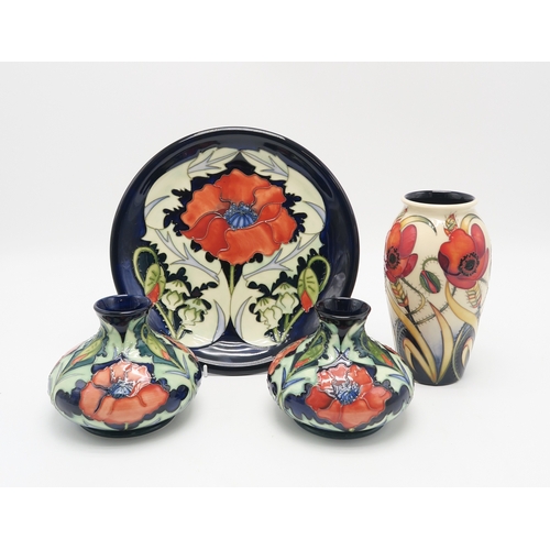 2230 - A PAIR OF MOORCROFT WILLIAM MORRIS POPPY PATTERN VASESof squat baluster form, each 11cm high, togeth... 