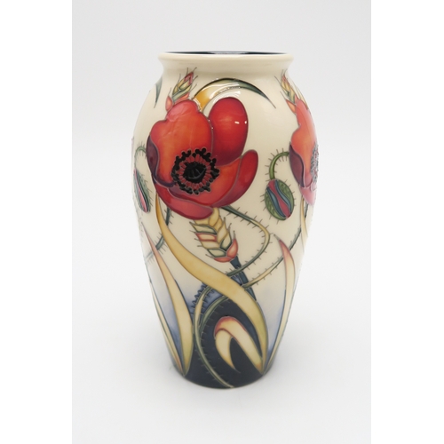 2230 - A PAIR OF MOORCROFT WILLIAM MORRIS POPPY PATTERN VASESof squat baluster form, each 11cm high, togeth... 