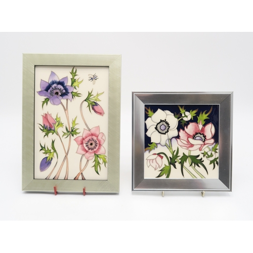 2232 - A MOORCROFT CHAMPAGNE ANEMONES PATTERN PLAQUE26cm x 18.5cm framed, circa 2023 together with a Pavoni... 