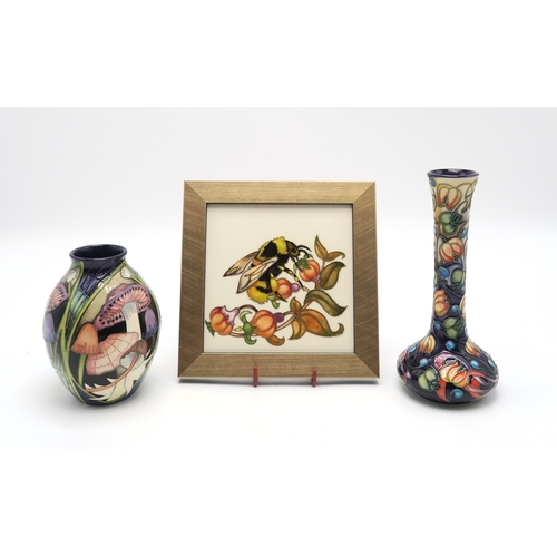 2236 - A MOORCROFT TWILIGHT BONNETS PATTERN VASEdesigned and signed by Vicky Lovett, 13.5cm high, together ... 