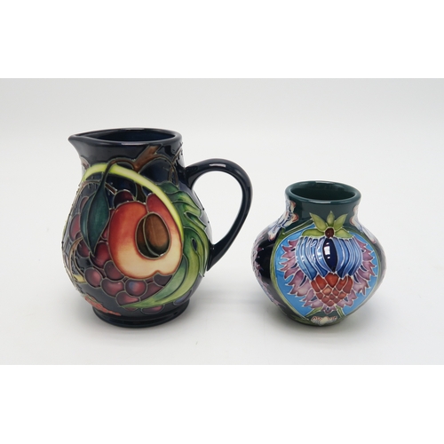 2238 - A MOORCROFT SAADIAN PATTERN MINIATURE VASEof bulbous form, 8cm high, a matching coaster/trinket dish... 