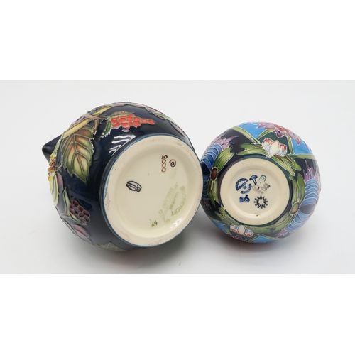 2238 - A MOORCROFT SAADIAN PATTERN MINIATURE VASEof bulbous form, 8cm high, a matching coaster/trinket dish... 