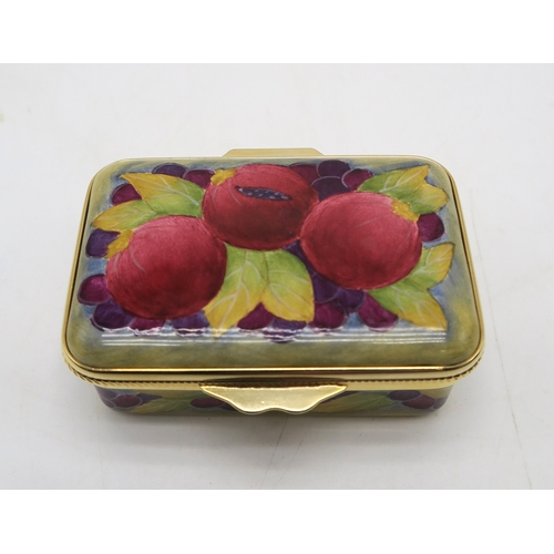 2241 - A MOORCROFT MINIATURE ENAMEL TRINKET BOXdecorated in the Pomegranate pattern, 6cm wide, boxed... 