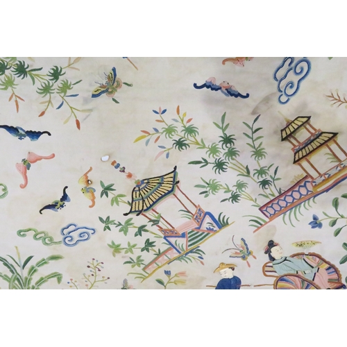 2359 - A CHINESE SILK EMBROIDERED COVERWoven with figures with painted ivory faces, animals, butterflies, p... 