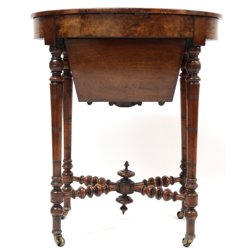 2012 - A VICTORIAN WALNUT & SATINWOOD INLAID SEWING TABLE with oval hinged top concealing fitted fretwo... 