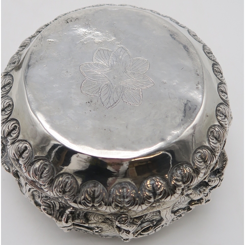 2364 - A BURMESE WHITE METAL BOWL Decorated with a frieze of dancing figures,divided by trees and with... 